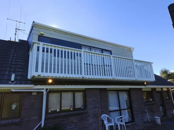 New white second-storey balustrades after