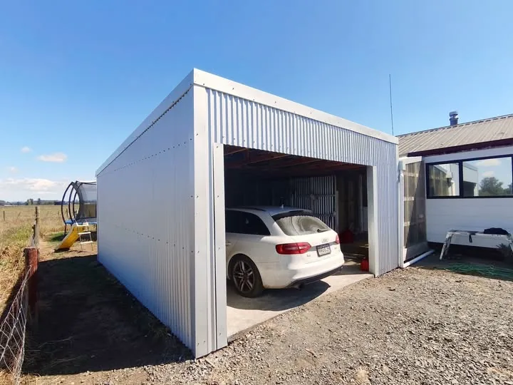 New garage clad in vertical corrugate