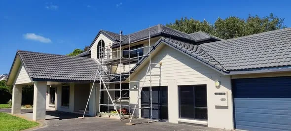 Roof renovation on a two-storey home with scaffolding up